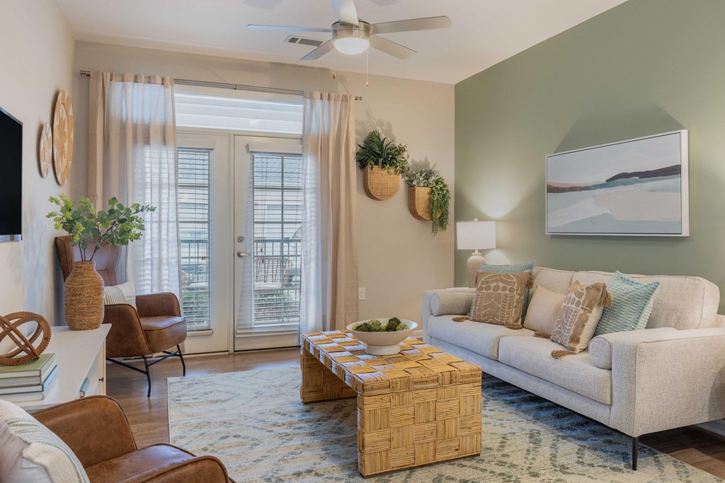 a living room with a couch and a table