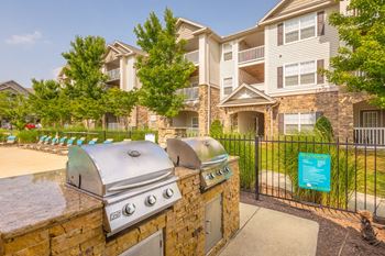 Grill your favorites by the pool at Hawthorne at the Meadows