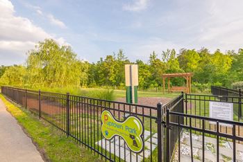 Leash free bark park with agility equipment at Hawthorne at the Meadows