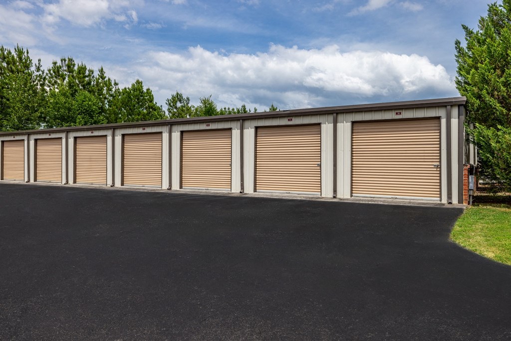 a row of garage doors on the side of a building