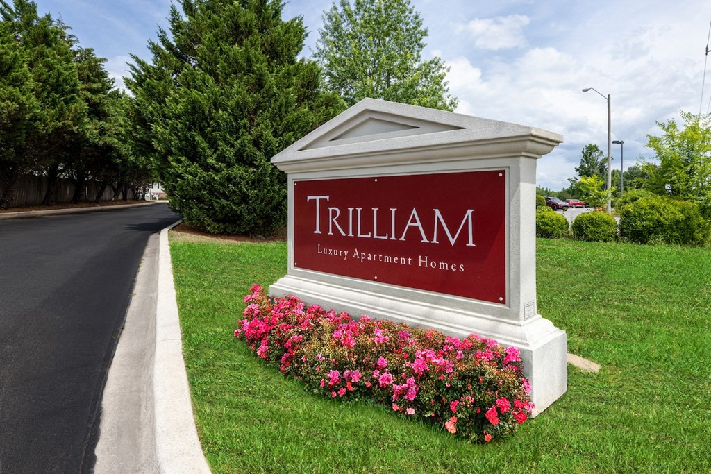 a sign for trillium at the side of a road