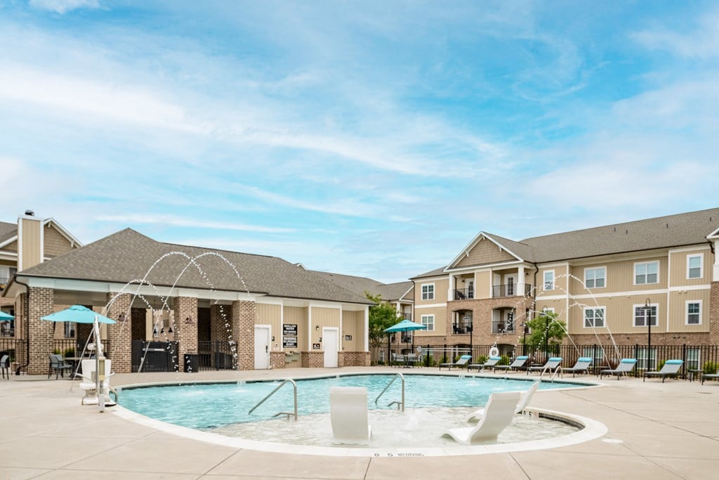 the preserve at ballantyne commons community swimming pool with apartment buildings