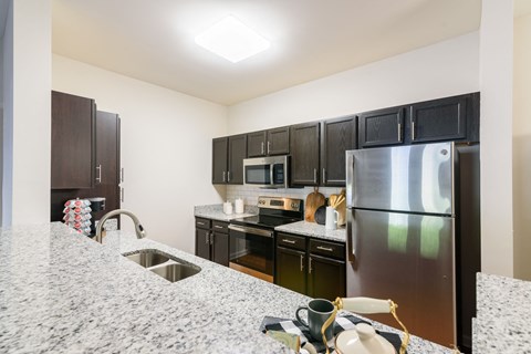 Custom Designed Kitchen With Ample Storage and Countertop Space