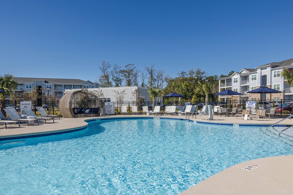 a swimming pool at the resort on a sunny day