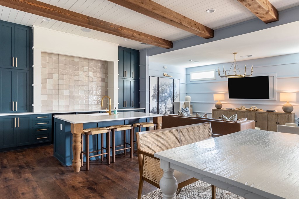 a view of the kitchen and living room from the dining area