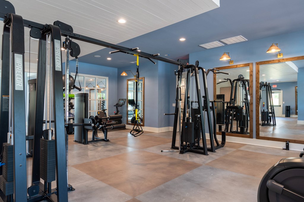 a home gym with a variety of exercise equipment
