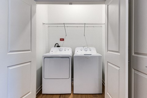 a washer and dryer in the laundry room of a home