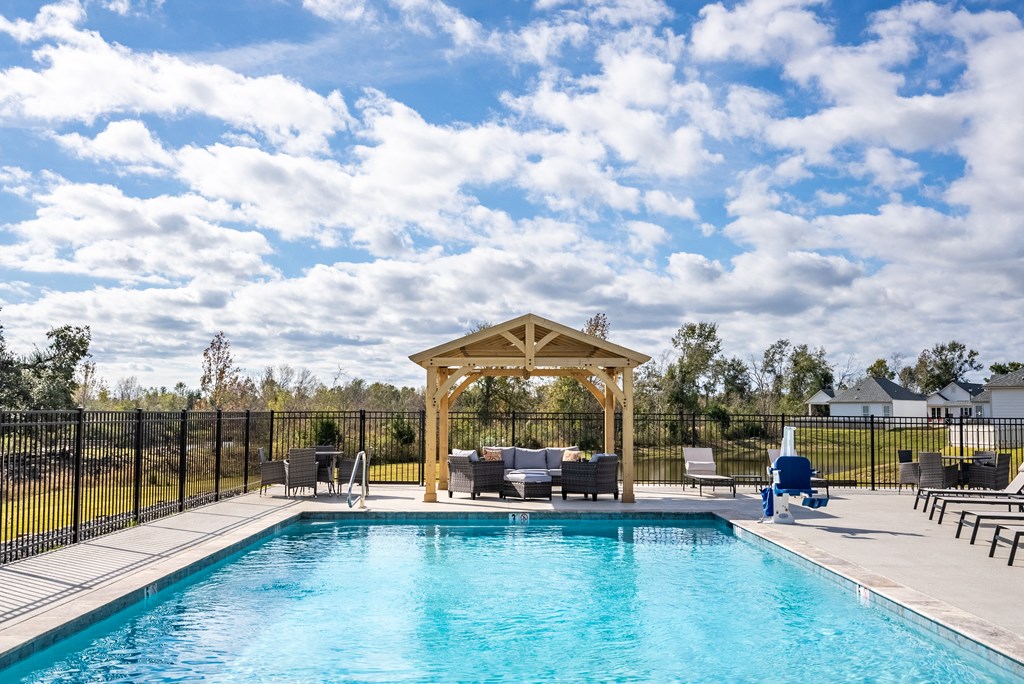 the pool and gazebo at the resort at governors residence
