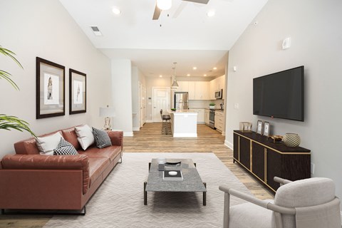 a living room with a couch and a tv