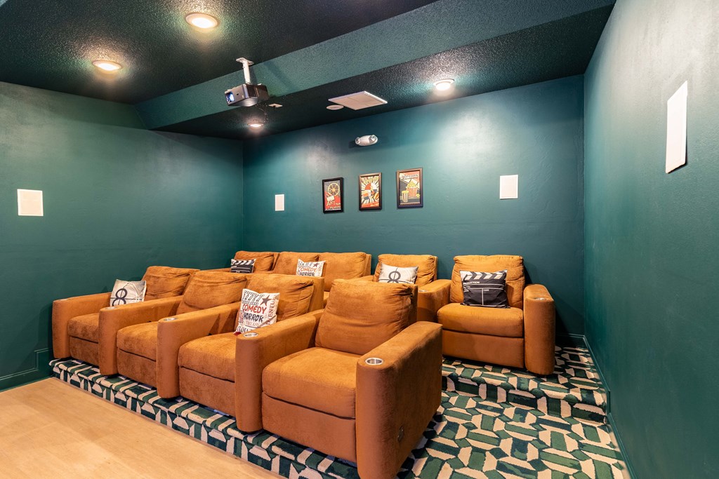 Modern Media Room with Theater-Style Seating and HD Screen