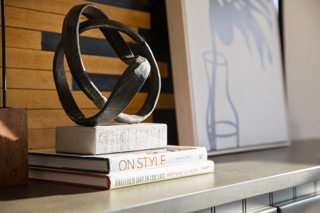 A book and decorations at 27Seventy Lower Heights apartments in Houston, TX.