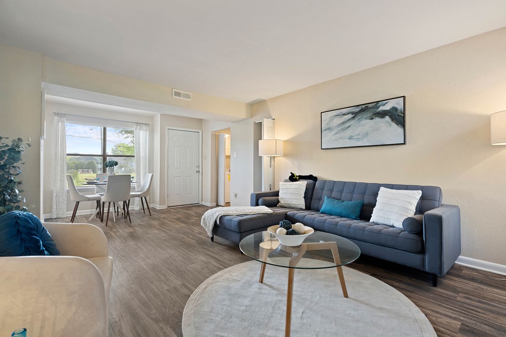 a living room with a couch and a table