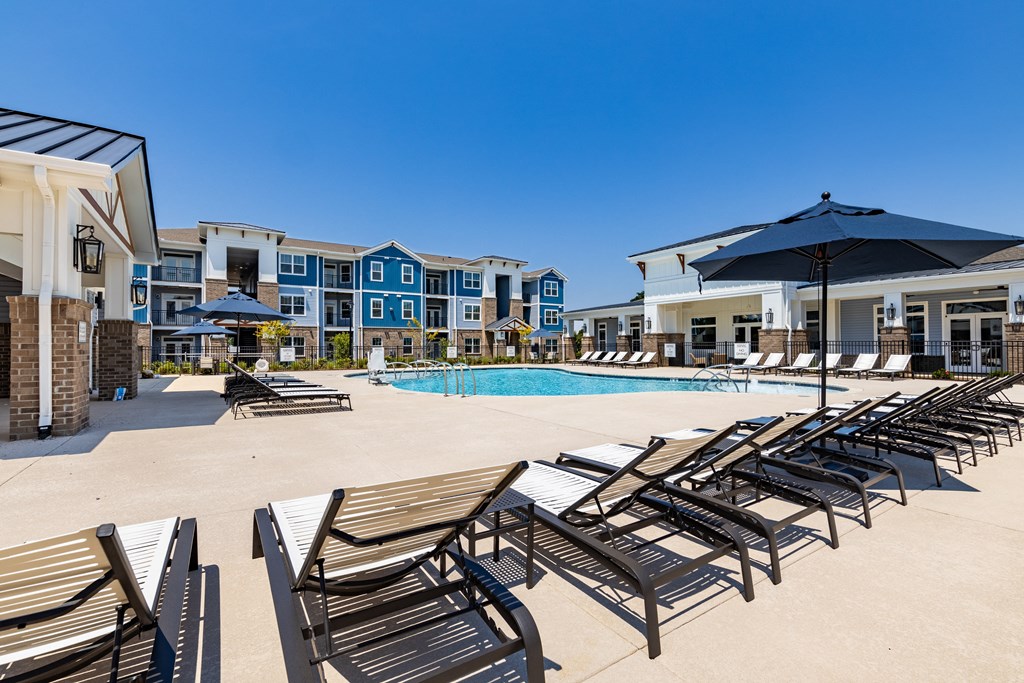 our apartments have a large pool and lounge chairs
