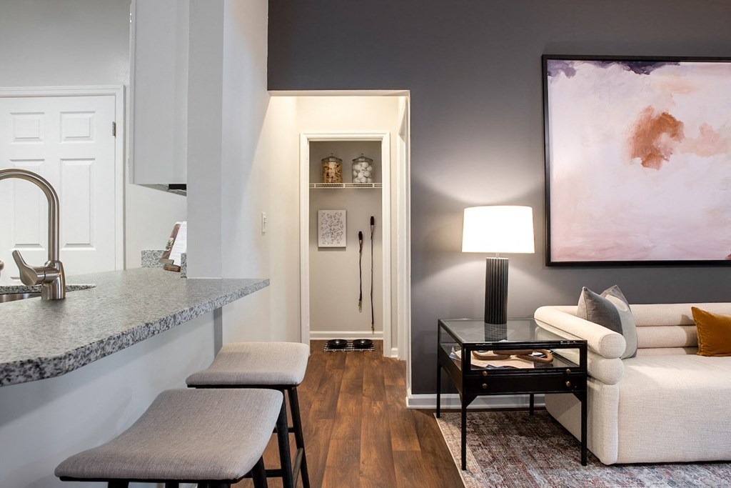 a living room with a couch and a table