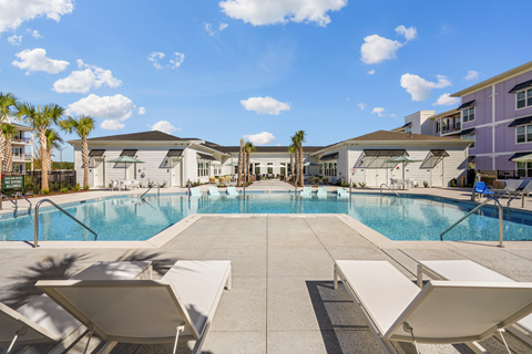 our apartments have a large pool and lounge chairs