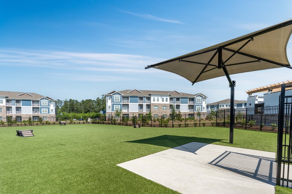 the preserve at ballantyne commons clubhouse with lawn and shade