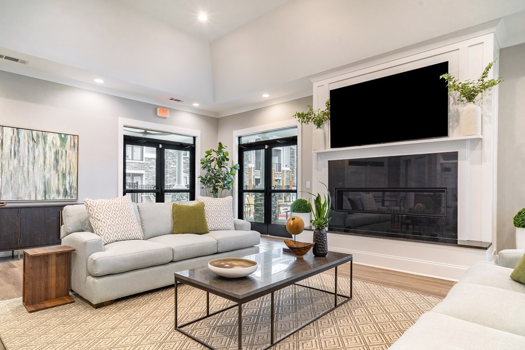a living room with a couch and a television