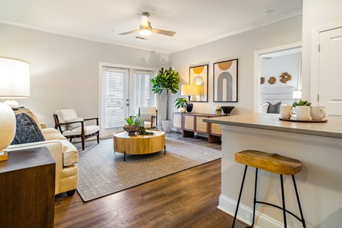 a living room with a couch and a table