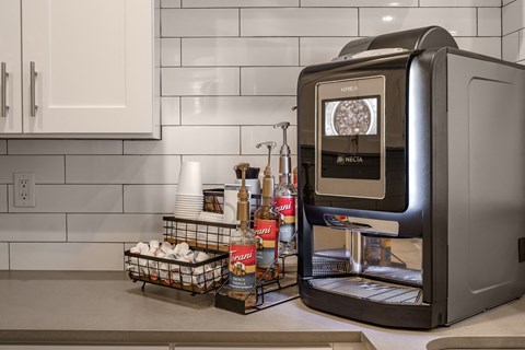 a kitchen with a toaster oven on the counter and a counter top with food