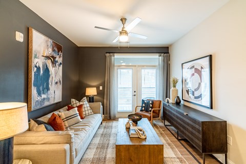 Spacious Living Room that Peeks out to the Patio