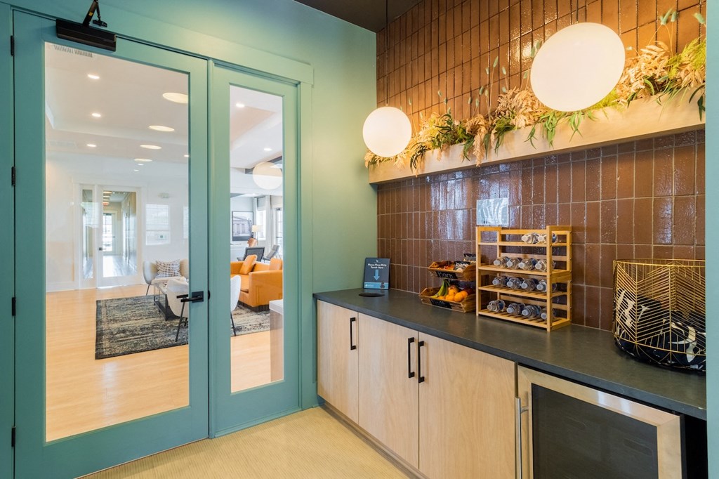 a view of the kitchen and living room from the entrance