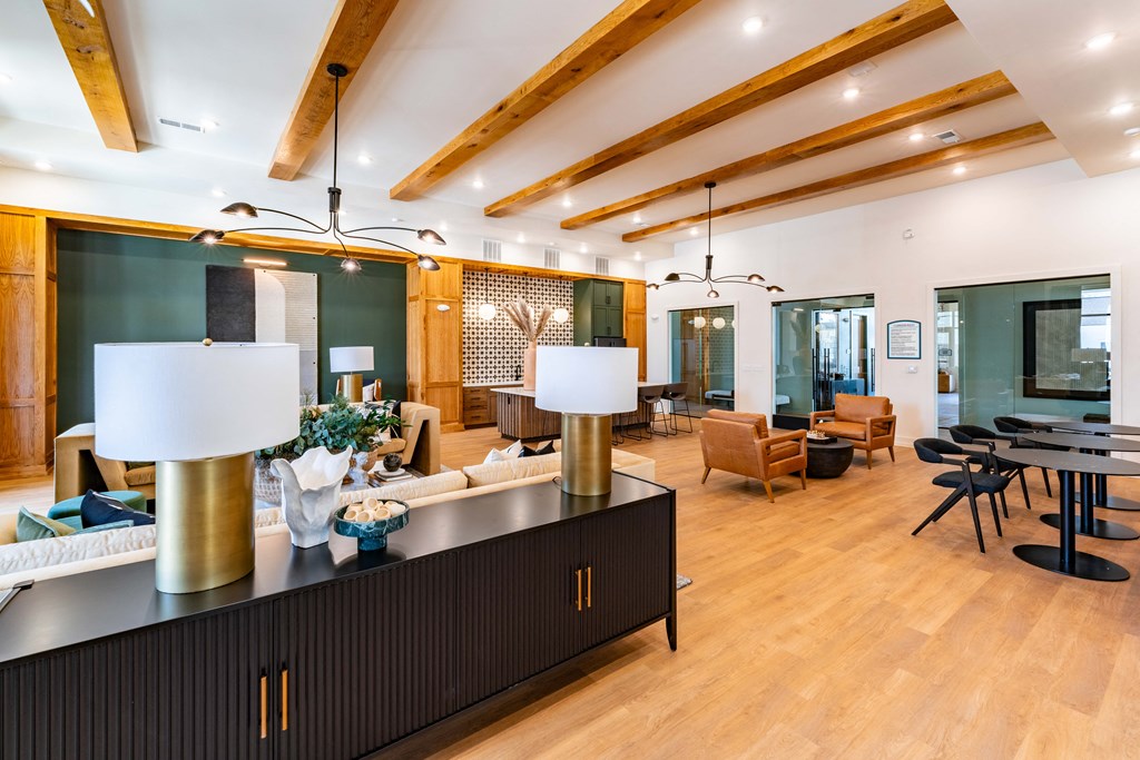 A modern living room with a wooden floor and ceiling.