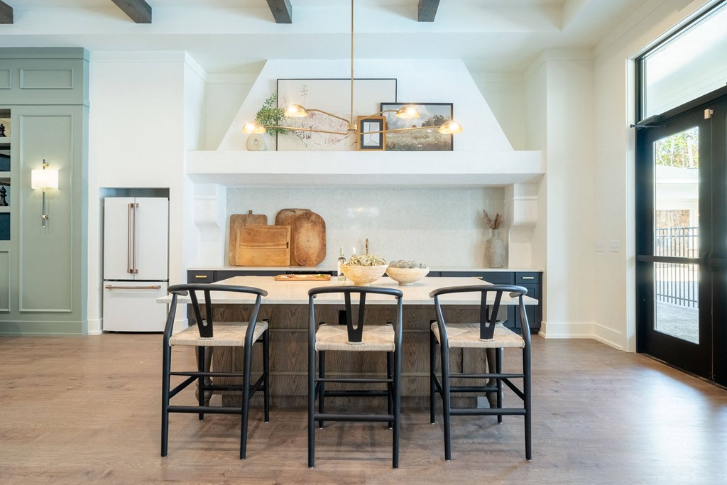 Amenities A dining room with a table set for four.