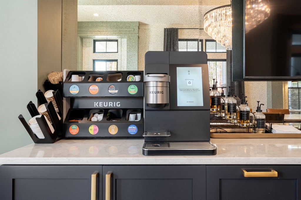 a keurig coffee maker sitting on top of a kitchen counter