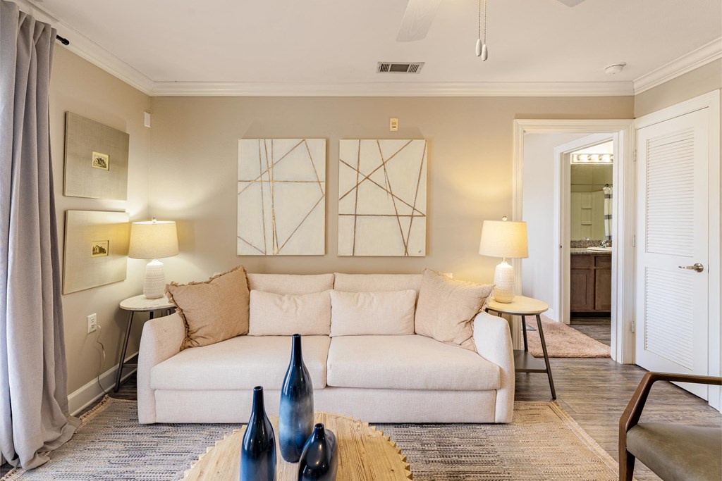 a living room with a couch and a table