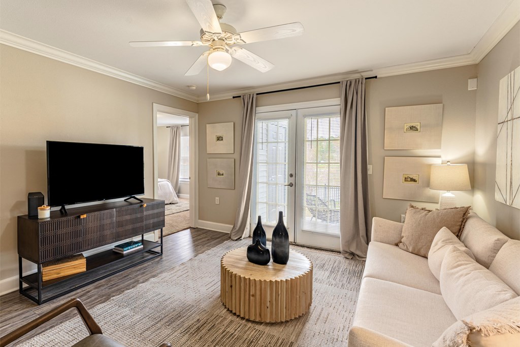 a living room with a couch and a tv