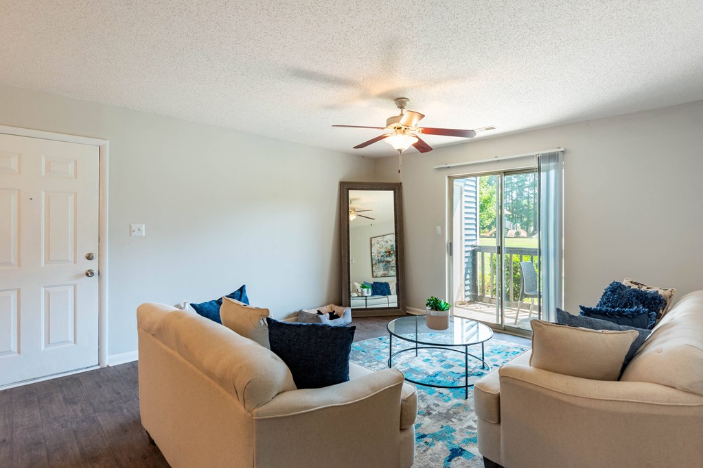 a living room with two couches and a coffee table