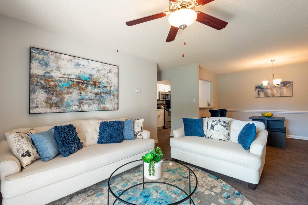 a living room with two couches and a coffee table