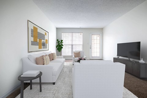 A living room with a white couch, a white coffee table, and a large painting on the wall.