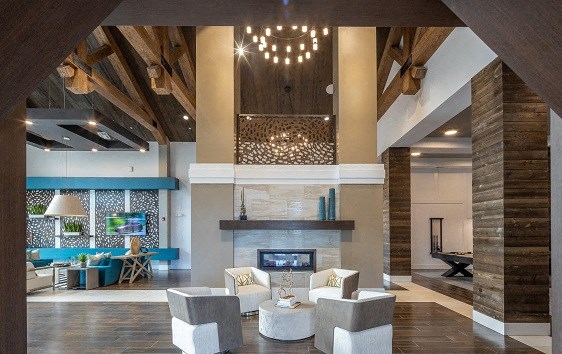 a living room with couches and a fireplace