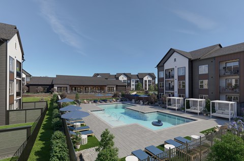 A large outdoor swimming pool surrounded by lounge chairs and umbrellas.