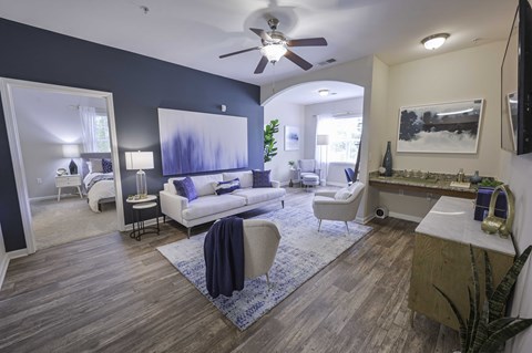 Open-Concept Living Room and Sunroom with Built-in Desk