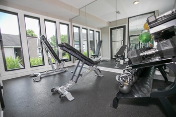 fitness center and weight benches - Photo Gallery 9