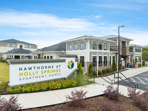 the entrance to hawthorne at holly springs apartment homes