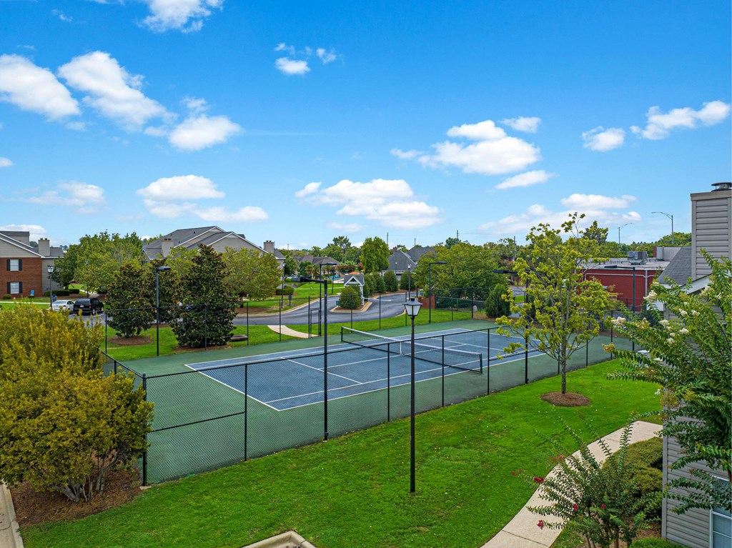 an aerial view of the tennis courts at the estates at spring valley
