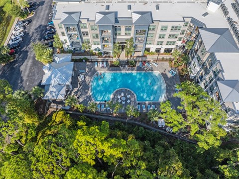 an aerial view of the pool at the resort at longboat key club