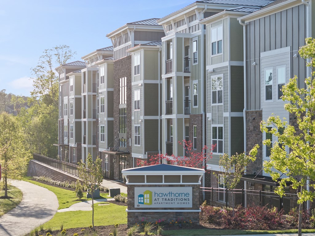 A Hawthorne at Traditions building with a sign in front.