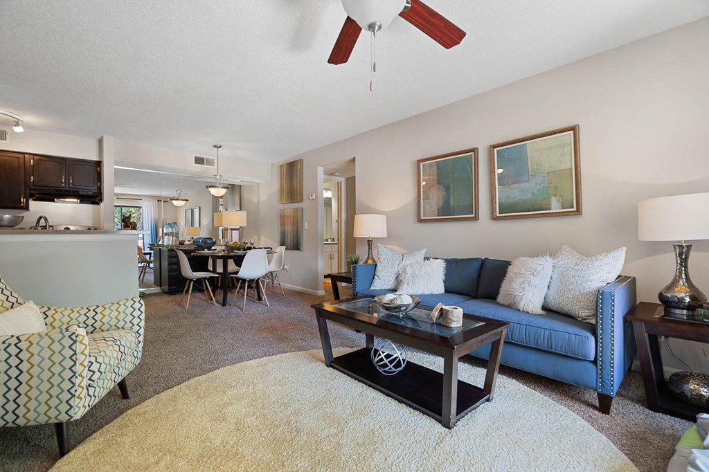 a living room with a couch and a table