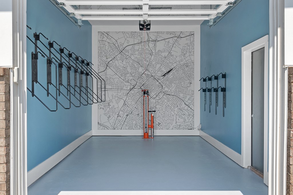 a room with a map on the wall and a blue floor