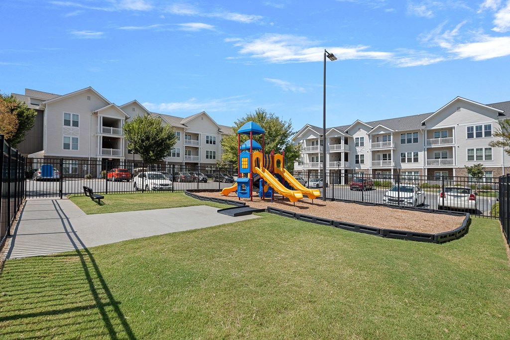 the preserve at ballantyne commons play area with playground and apartments