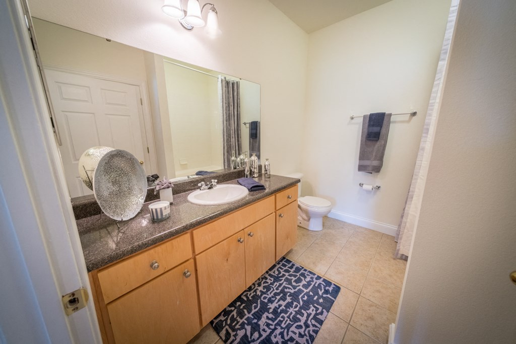 a star made out of shattered glass on a wall