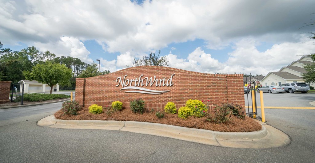 the sign at the entrance to the northeast parking lot at the northwest dealership