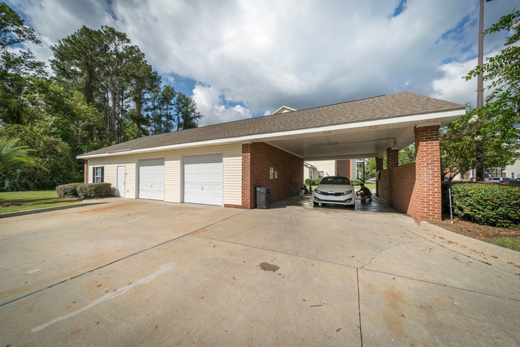 a group of beds in a room with colored lights