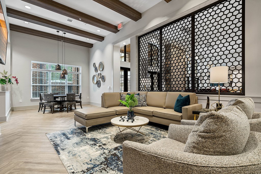 a living room with a couch and a table