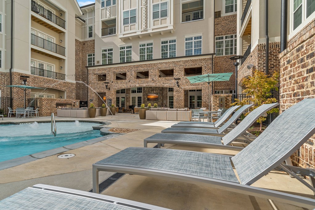 our apartments have a swimming pool and outdoor furniture