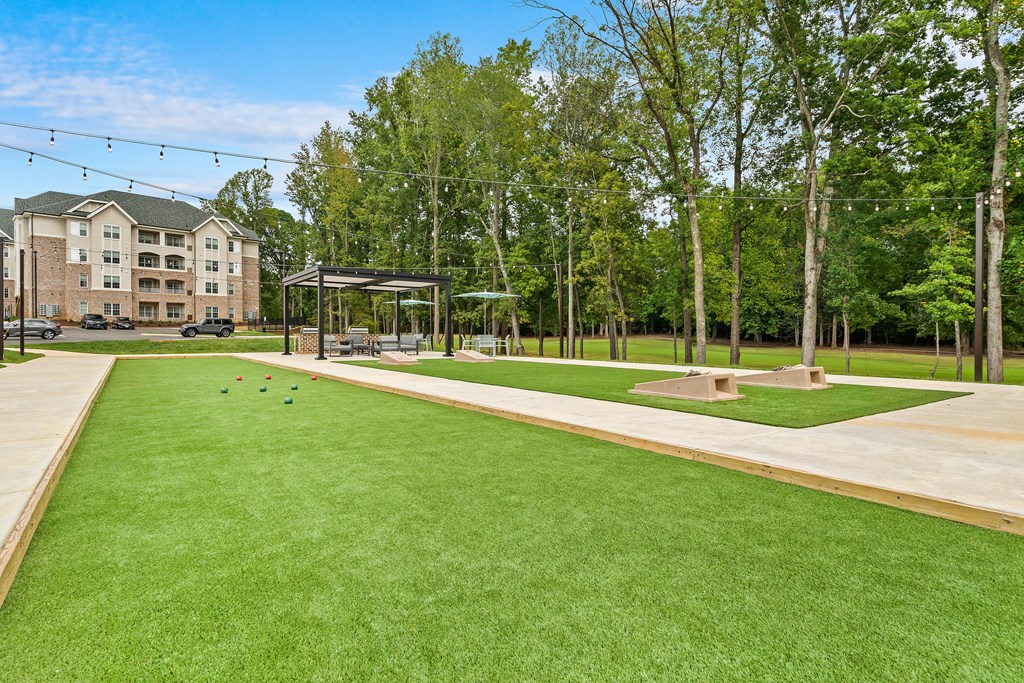a park with bocce balls on the grass